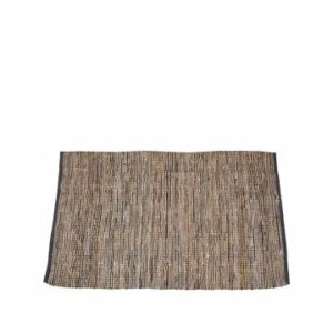 Wohntrends 2026 - Wohntextilien - handgefertigter Teppich aus Jute und Lederresten