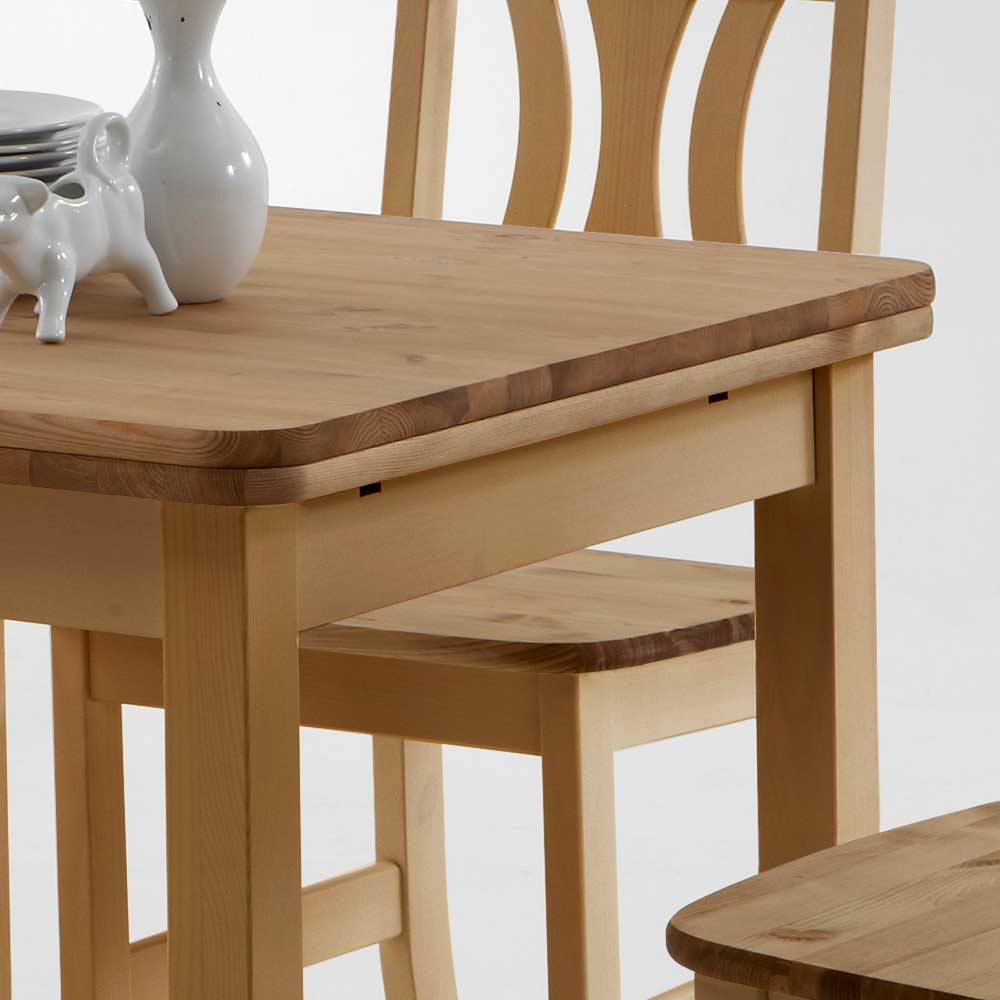 Esstisch aus massiver Kiefer mit abgerundeter Tischplatte und eleganter Holzmaserung – Laticosia