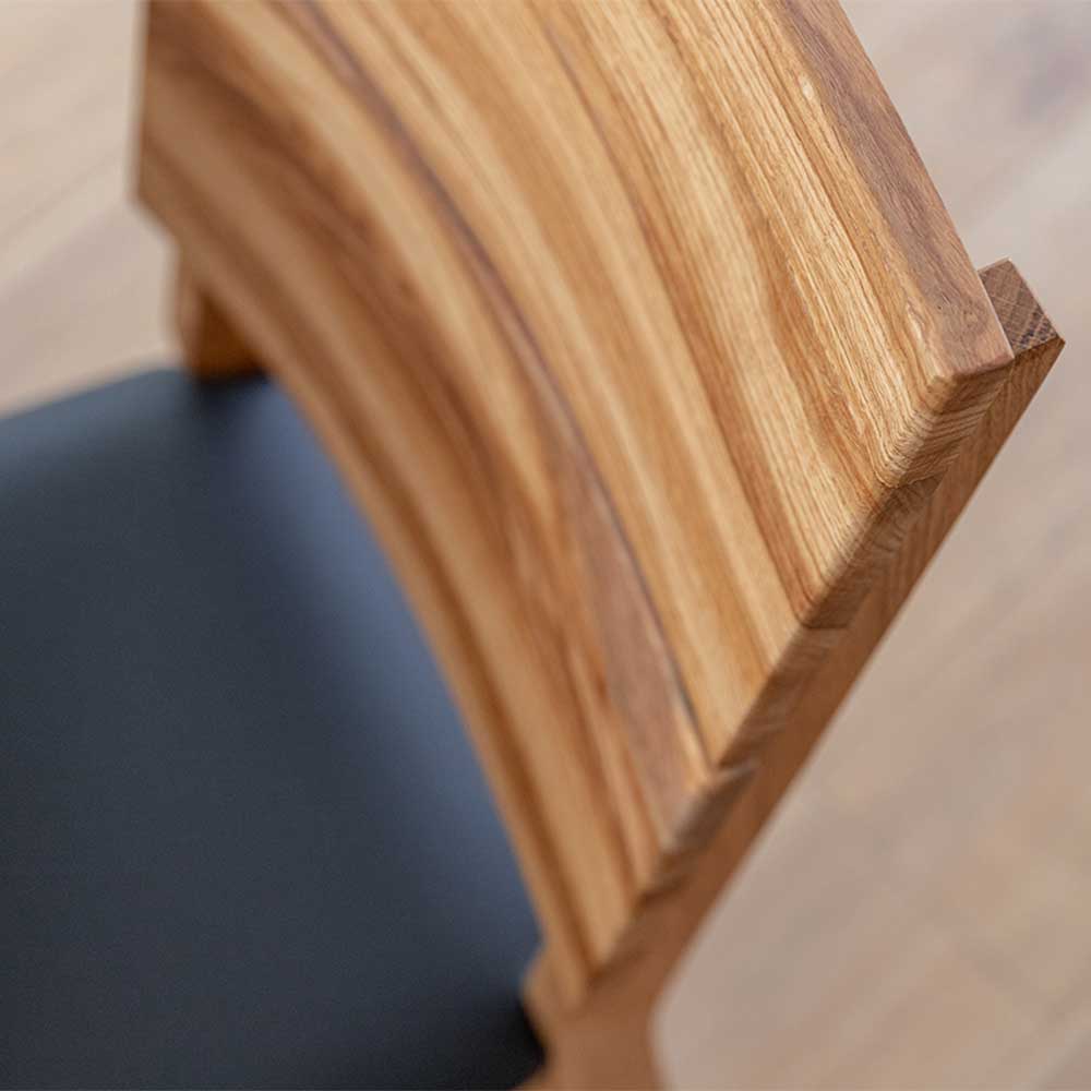 Design Holzstuhl massiv mit Kunstleder Sitz - Dosario