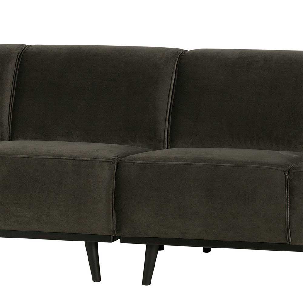Verbindung der modularen Elemente des dunkelgrünen Samtsofas mit stabilen schwarzen Füßen – Italiano