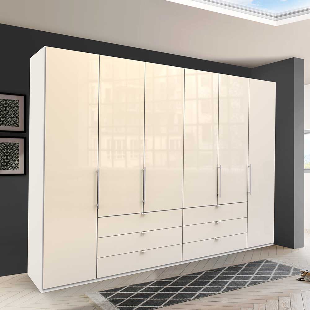 Großer Kleiderschrank in Creme Hochglanz mit vier Gleittüren und sechs Schubladen – Zidarie
