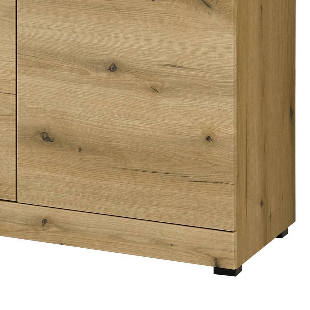 Sockelbereich des Sideboards in natürlicher Eichenholzoptik mit stabilen Füßen – Addara