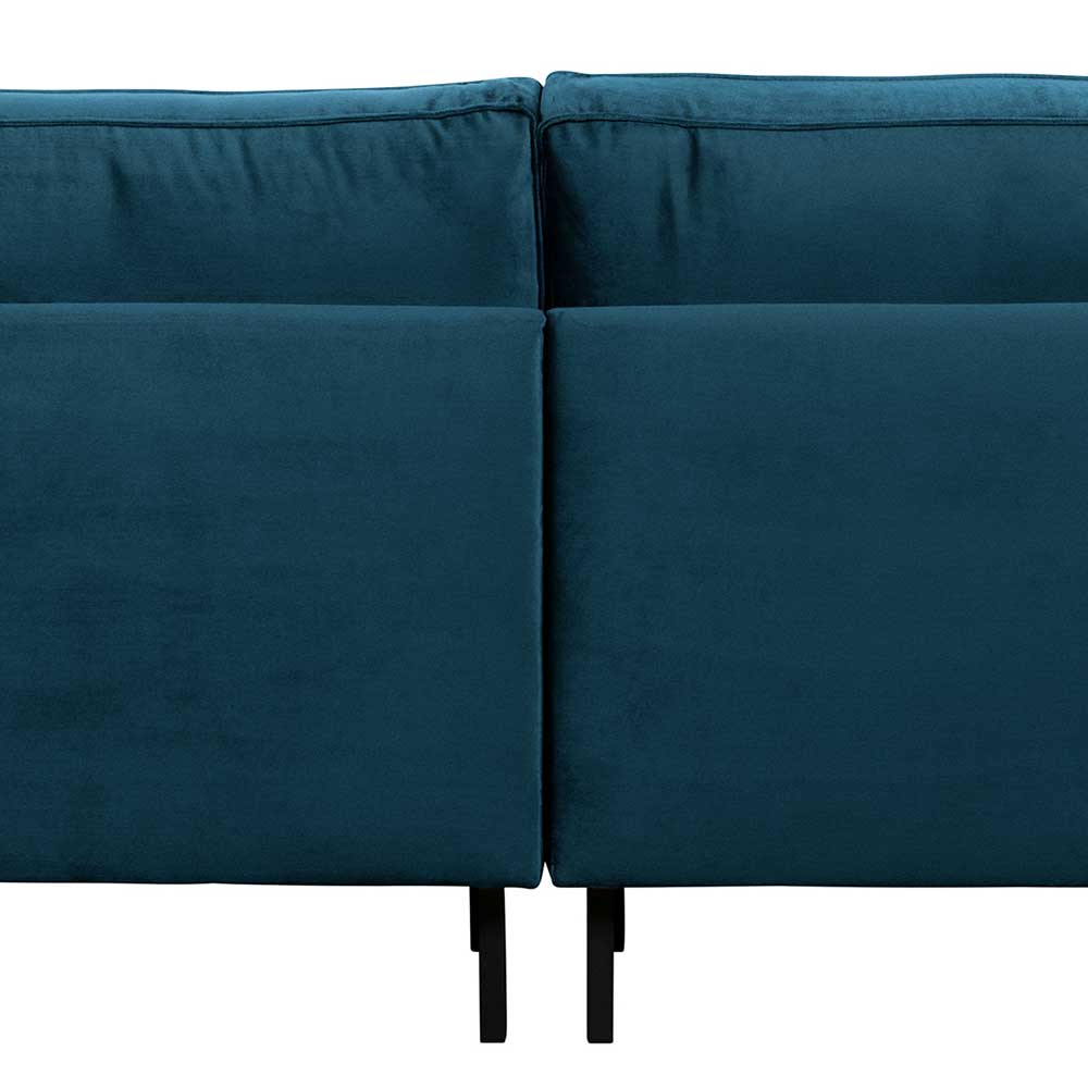 Detail der Rückseite des blauen Sofas mit Bezug aus Samt und schwarzen Füßen – Cumagon
