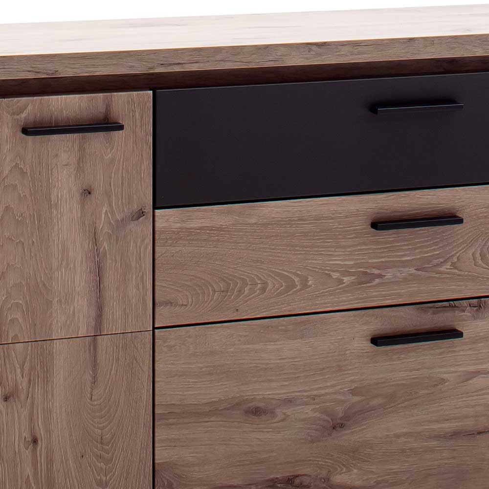 Schubladen und Türgriffe des Sideboards in Holzdekor und Anthrazit – Bekunion