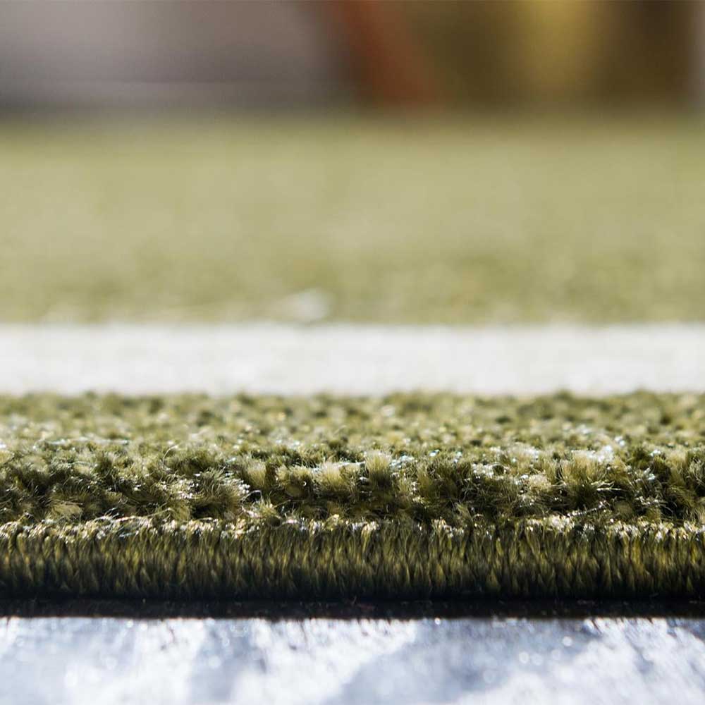 Teppich in Oliv Grün mit Rahmen in Creme - Loritana