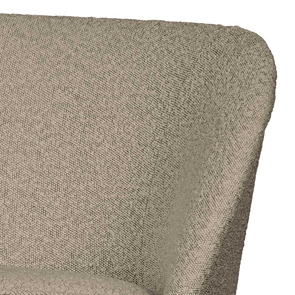 Detailansicht der beigen Boucle-Struktur und der geschwungenen Rückenlehne des Stuhls – Laderla