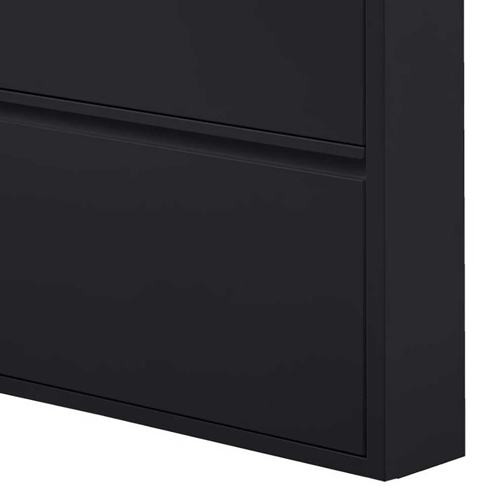 Unterer Eckbereich des schwarzen Schuhschranks mit robustem Metallgeh
use – Matic