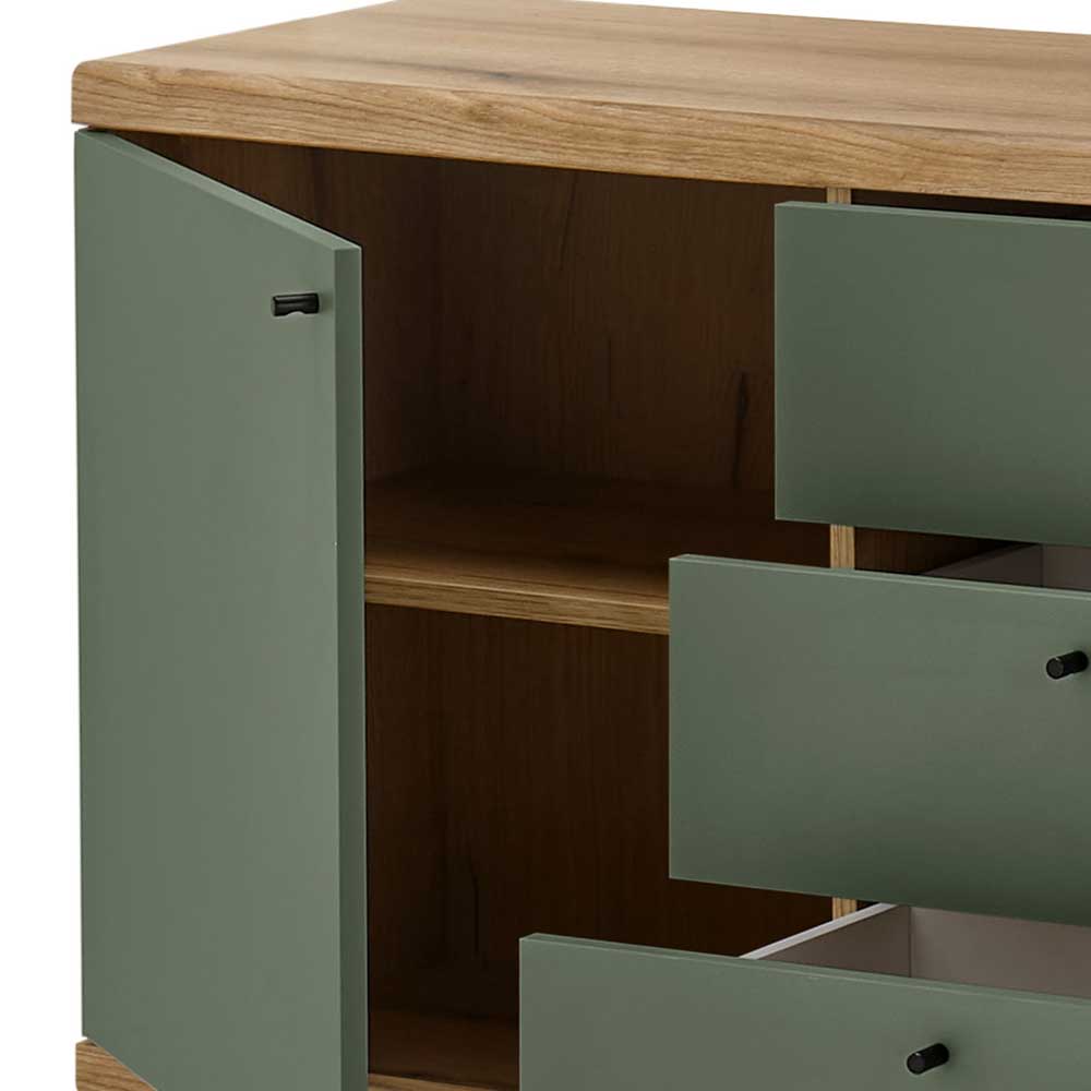 Offene Tür der Kommode mit Ablagefach und teilweise geöffneten Schubladen – Oliva