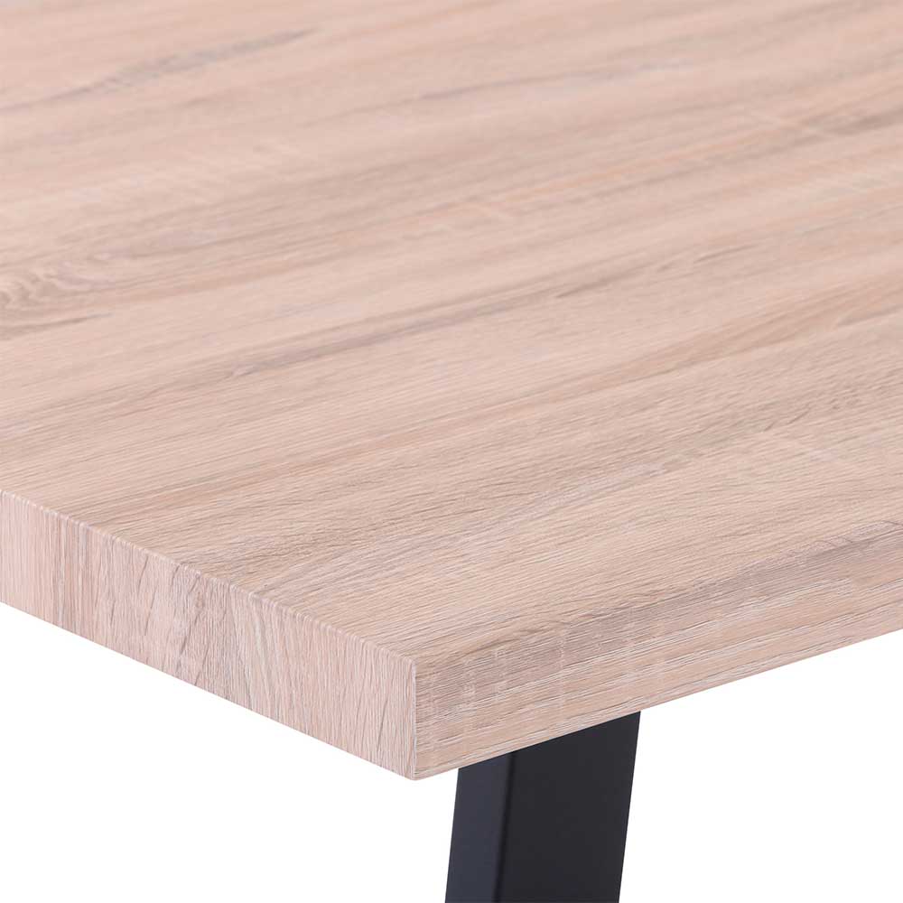 Helle Tischplatte in Holzoptik mit natürlicher Maserung und schwarzem Tischbein Detail – Sanjo