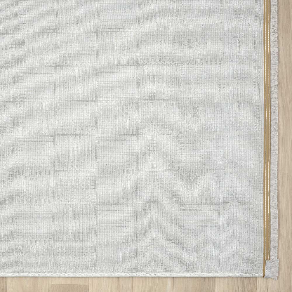 Rechteckiger Teppich in Creme mit Kachelmuster, Fransen und feiner goldener Kante für das Wohnzimmer – Pahat
