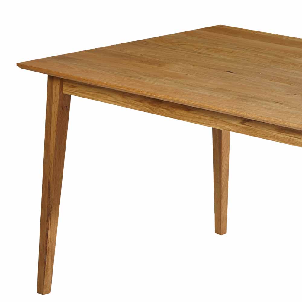 Holztisch aus massiver Wildeiche, schräg von oben mit Blick auf die konischen Tischbeine – Likes