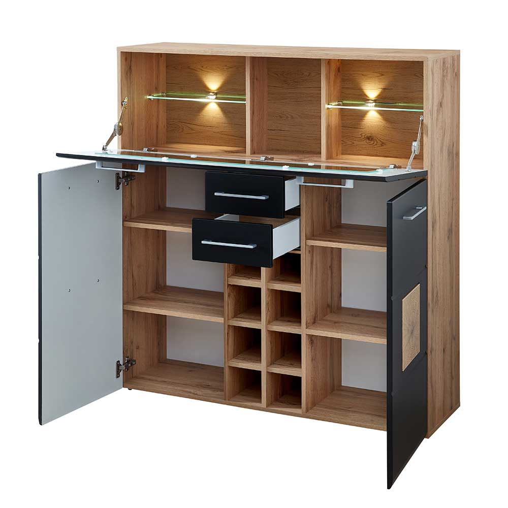 Geöffneter Wohnzimmer Barschrank mit vielen Fächern, Schubladen und Flaschenregal in Schwarz und Wildeiche – Kandu