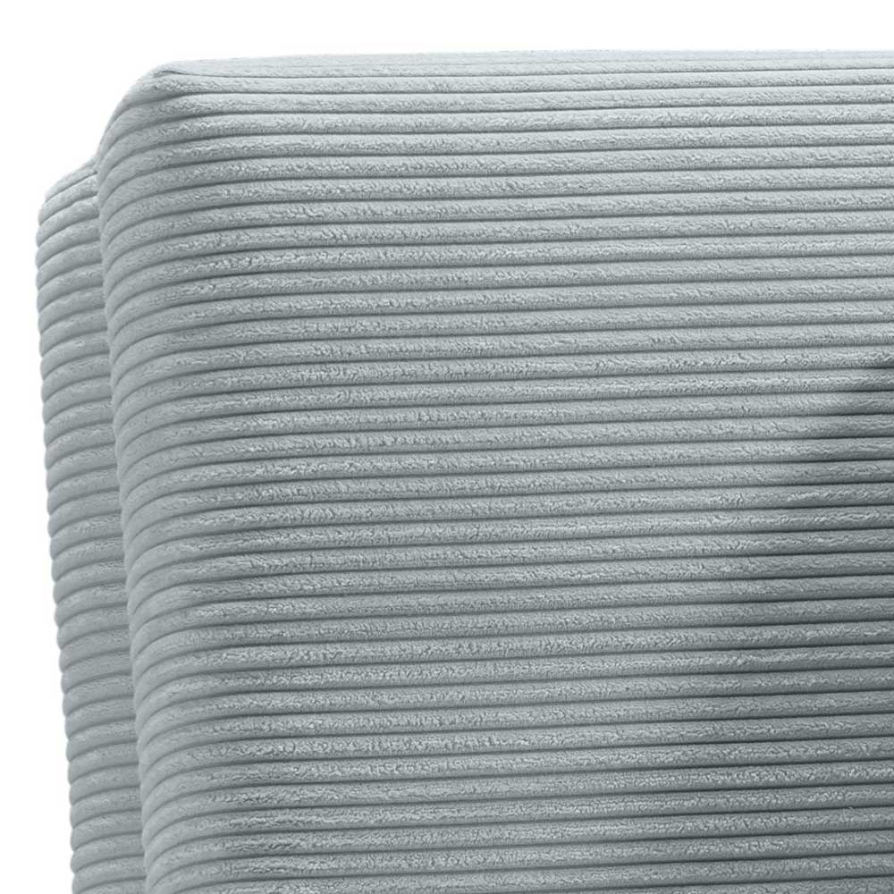 Detailansicht des weichen hellblauen Kordstoffbezugs und der gerundeten Kanten des Sessels – Lenox