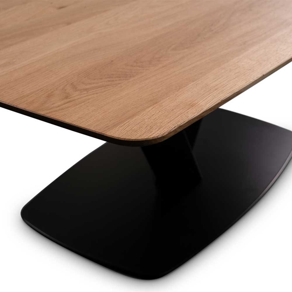 Abgerundete Holztischplatte und elegante schwarze Bodenplatte des Wohnzimmertisches – Castellon