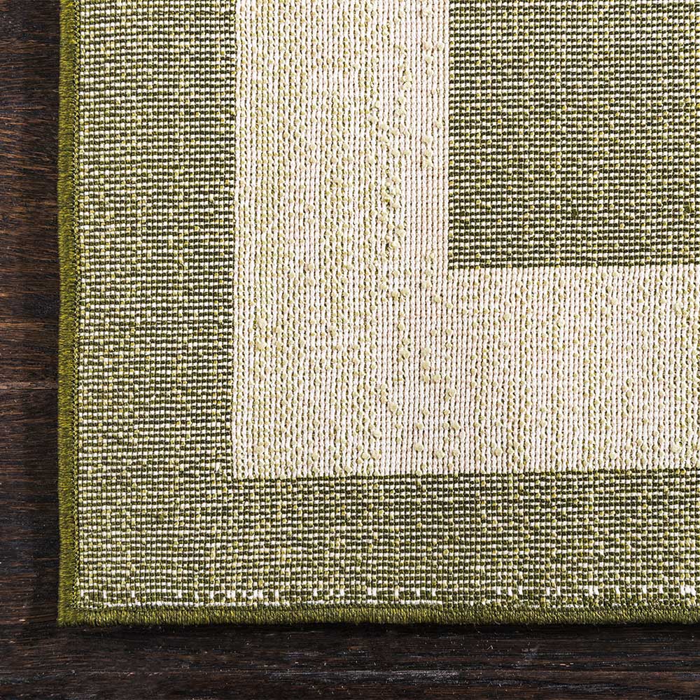 Teppich in Oliv Grün mit Rahmen in Creme - Loritana