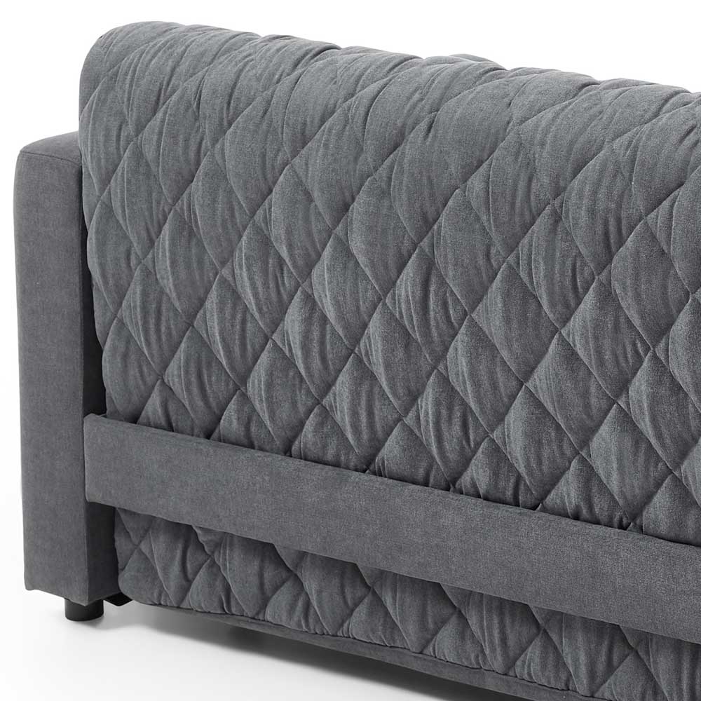 Gesteppte Rückenlehne des grauen Schlafsofas von hinten, diagonales Muster – Riconia