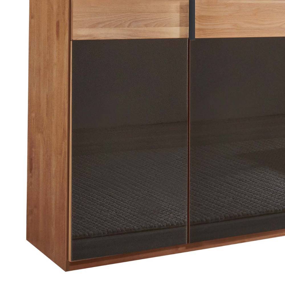 Unterer Bereich des Kleiderschranks mit dunkler Glasfront und heller Holzseitenwand – Hung