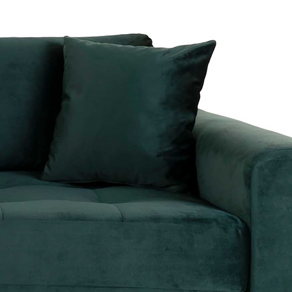 Detaillierte Ansicht der rechten Armlehne der dunkelgrünen Samt Couch mit Zierkissen – Secilia