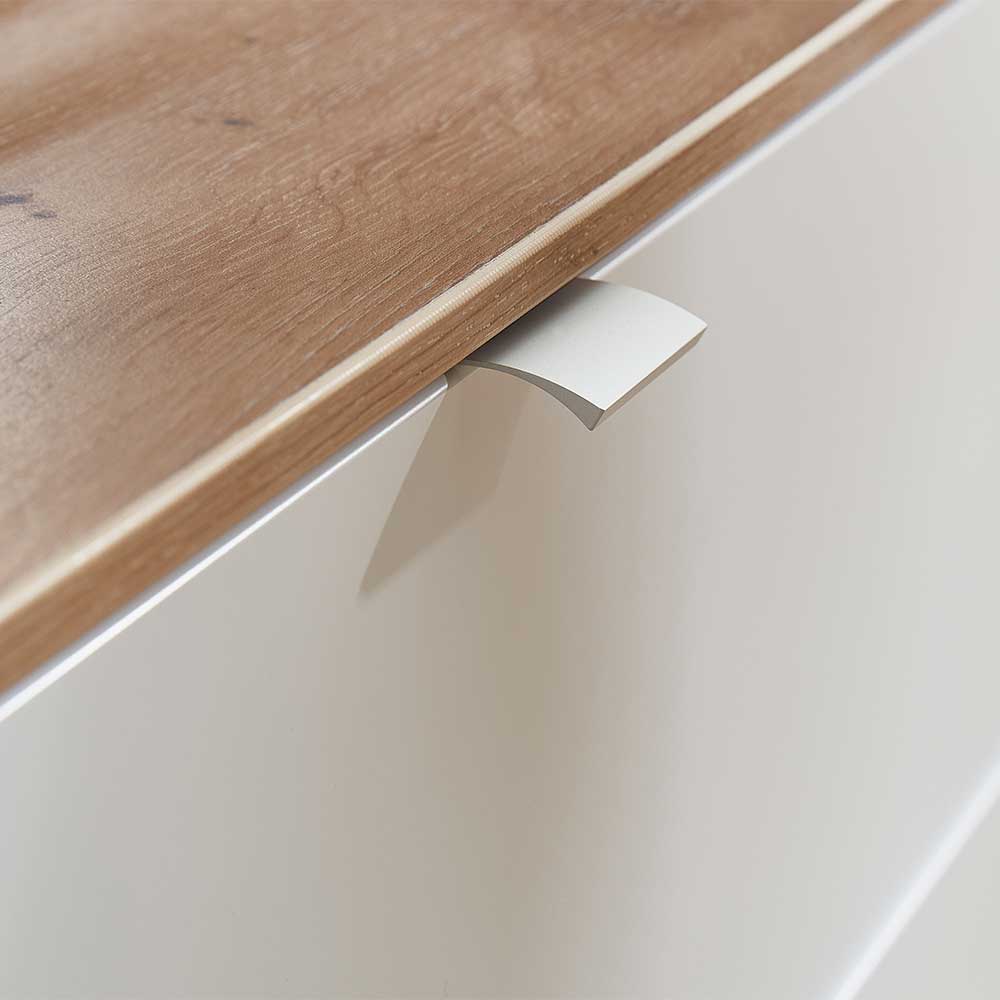Eleganter Metallgriff an der weißen Schublade des Sideboards mit Holzabdeckung – Astaran