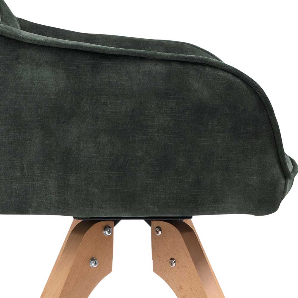 Armlehnen und Seitenbereich des dunkelgrünen Schalenstuhls mit Samtbezug – Kulstrado