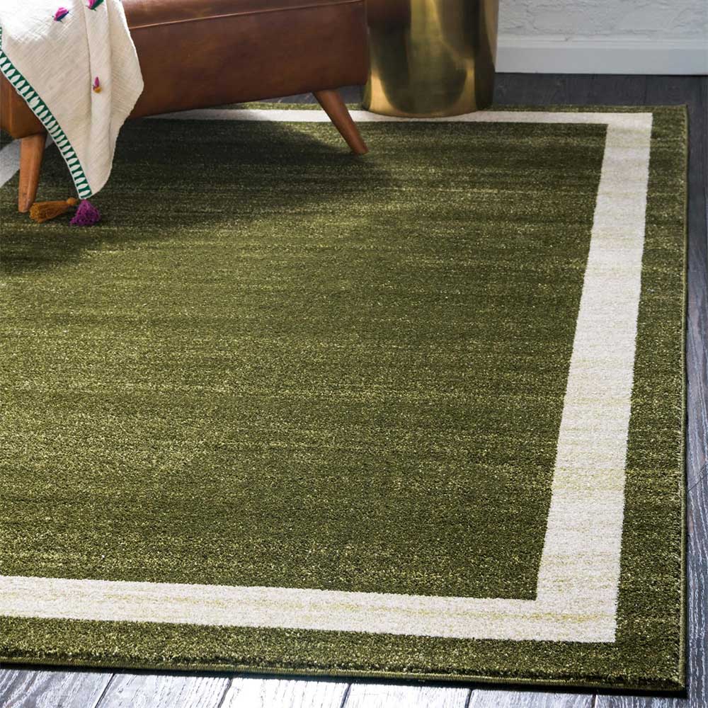 Teppich in Oliv Grün mit Rahmen in Creme - Loritana