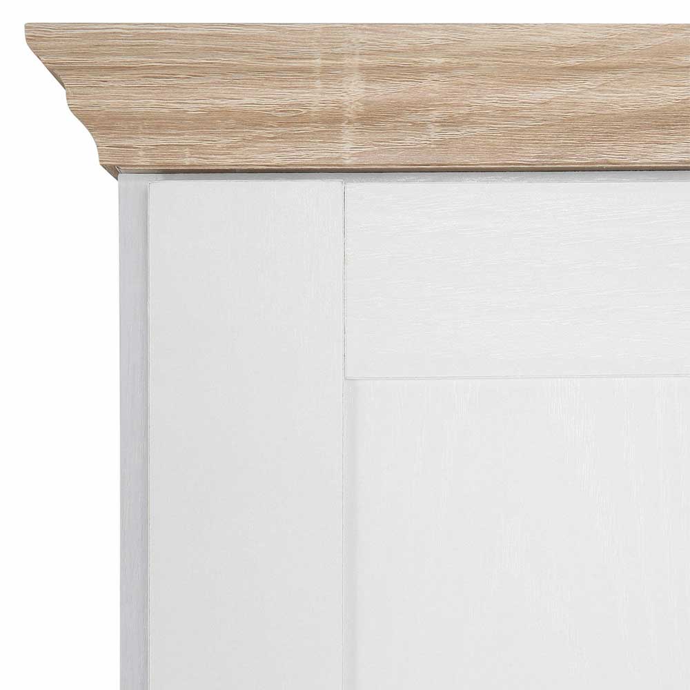 Detail der oberen rechten Ecke der Kommode mit Holzkranz und weißem Korpus – Ridron