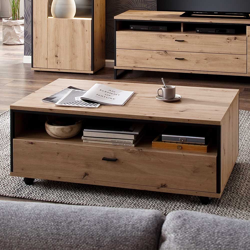 Schubladen Couchtisch in Holzoptik mit schwarzen Akzenten und Rollen im Wohnzimmer – Nikdus