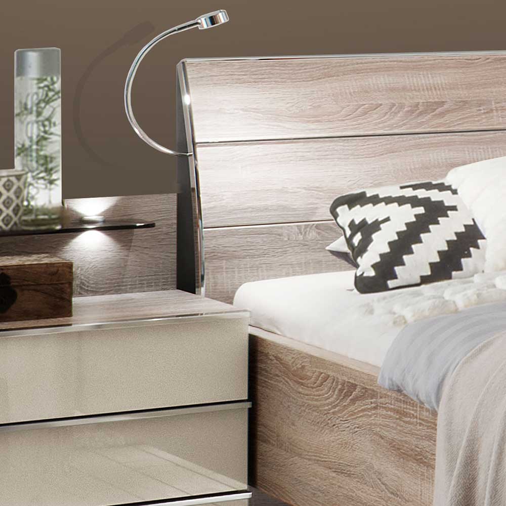 Nachttisch mit integrierter Beleuchtung und Kopfteil des Bettes in Holzoptik – Rativian