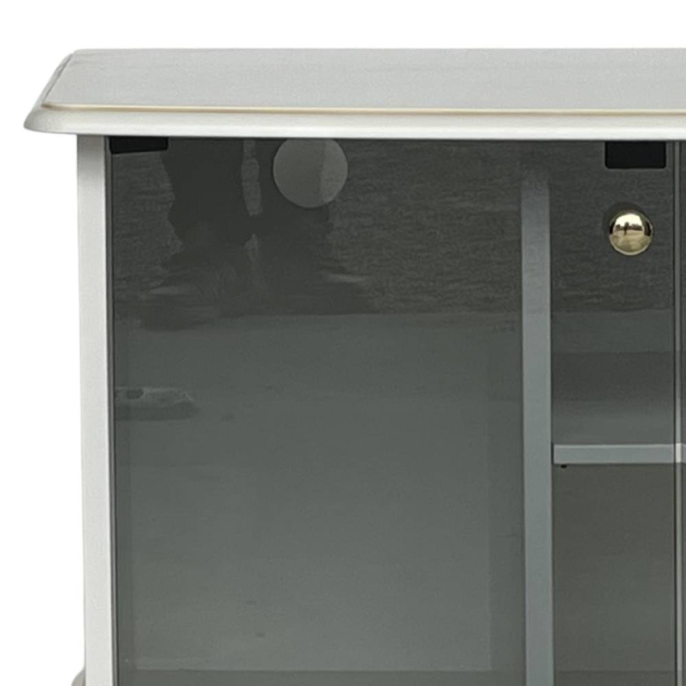 Oberer Bereich des TV Boards mit Glastür, goldenem Griff und runder Kabelöffnung – Kopenhagen