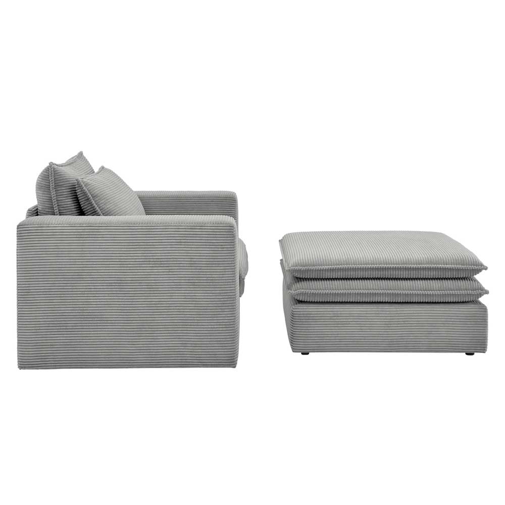 Seitliche Ansicht des grauen Cord Sitzsessels und Hockers als Set – Tessina
