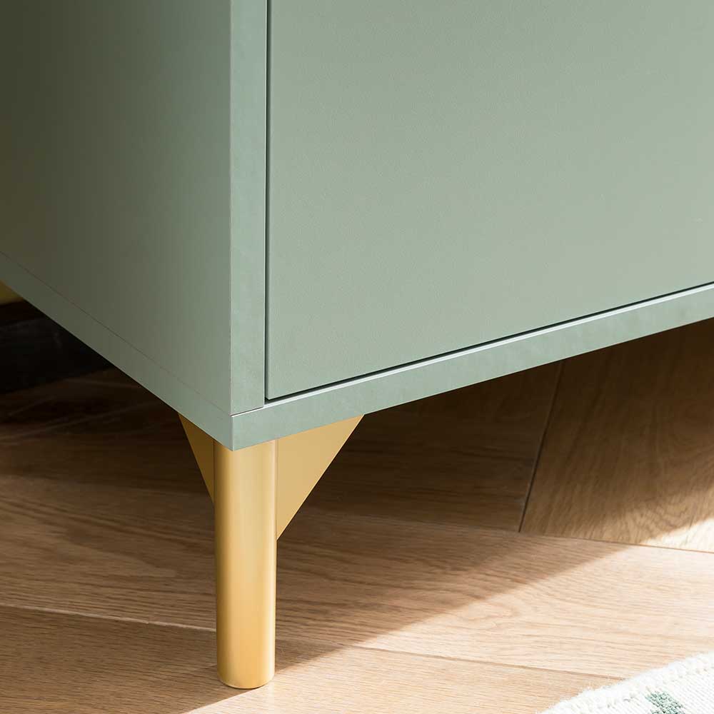Elegante goldene Füße des graugrünen Badezimmerschranks auf Holzfußboden – Vilatata