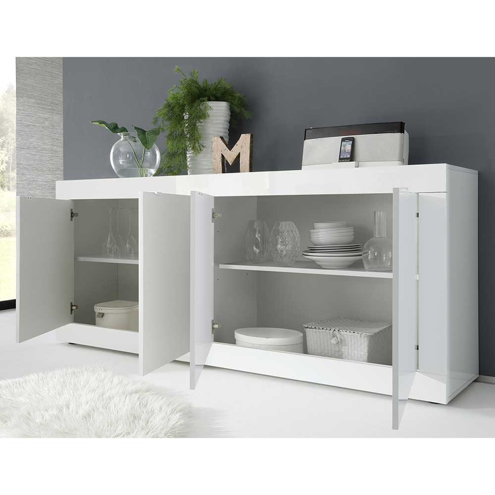 Weißes Hochglanz Sideboard mit geöffneten Türen und Stauraum für Geschirr im Wohnzimmer – Sogno