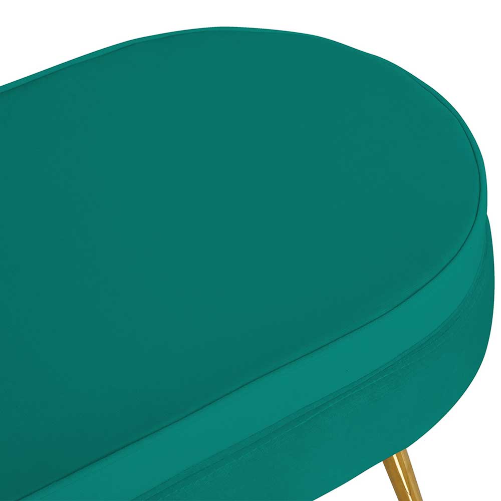 Grüner Samtbezug des Hockers mit feiner Textur und eleganten Rundungen für modernen Stil – Gavy