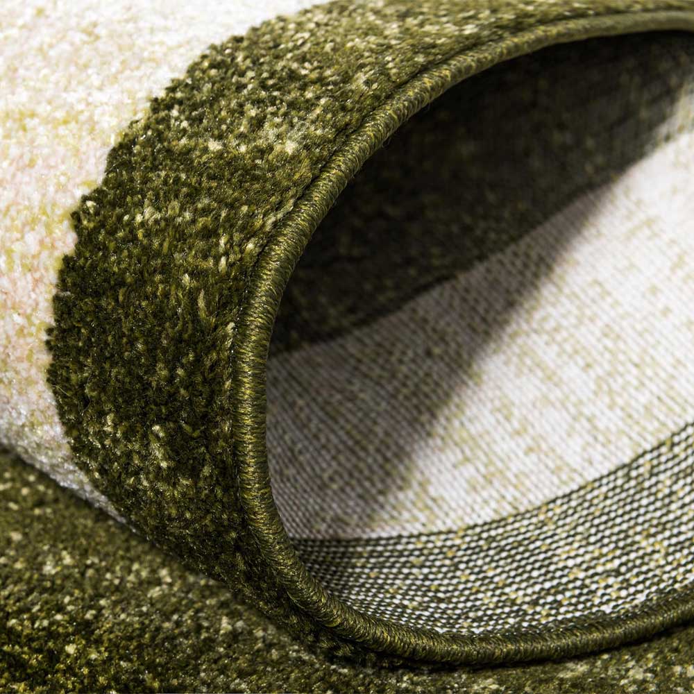 Teppich in Oliv Grün mit Rahmen in Creme - Loritana
