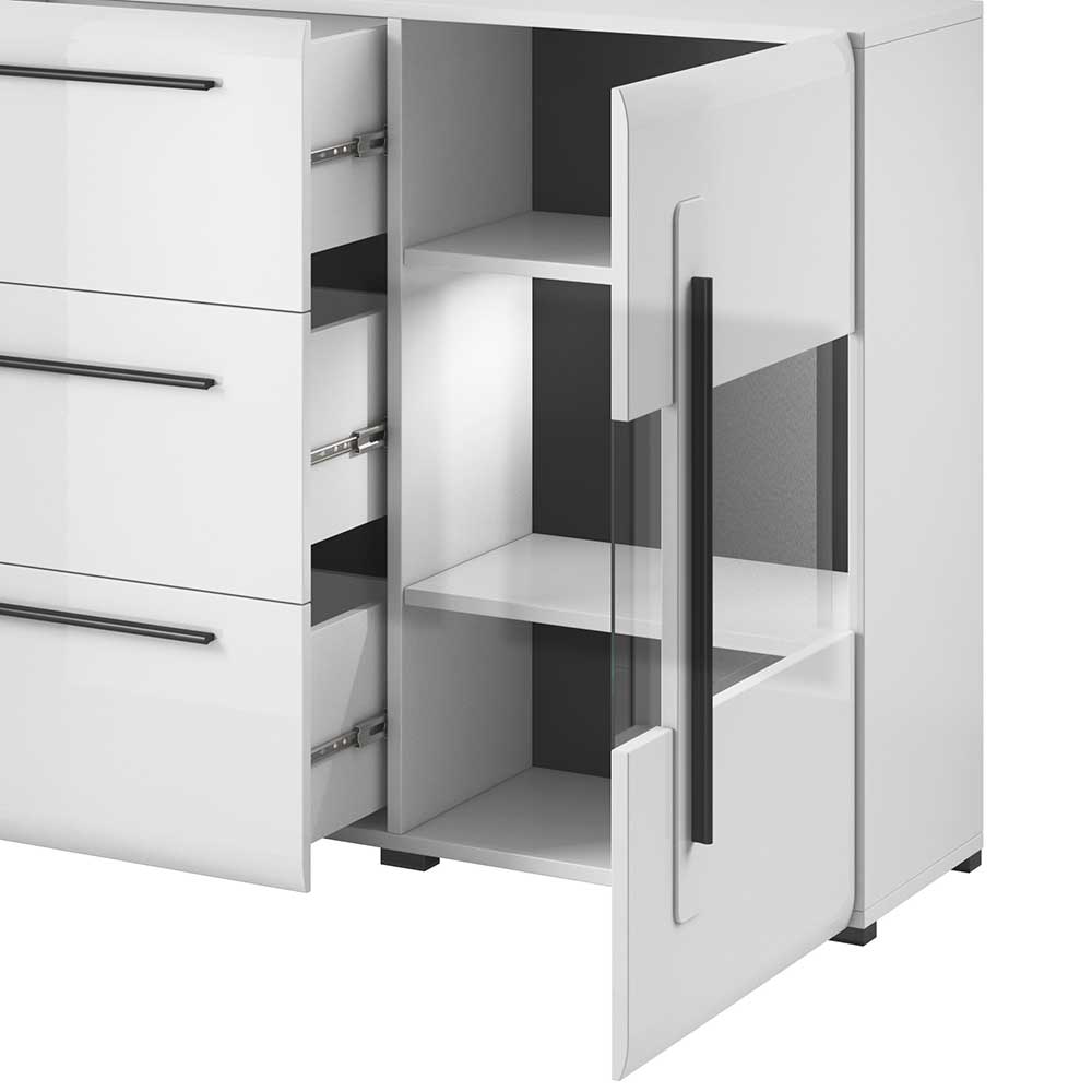 Modernes weißes Sideboard mit glänzender Oberfläche, offener Glastür und ausziehbaren Schubladen – Baranoma