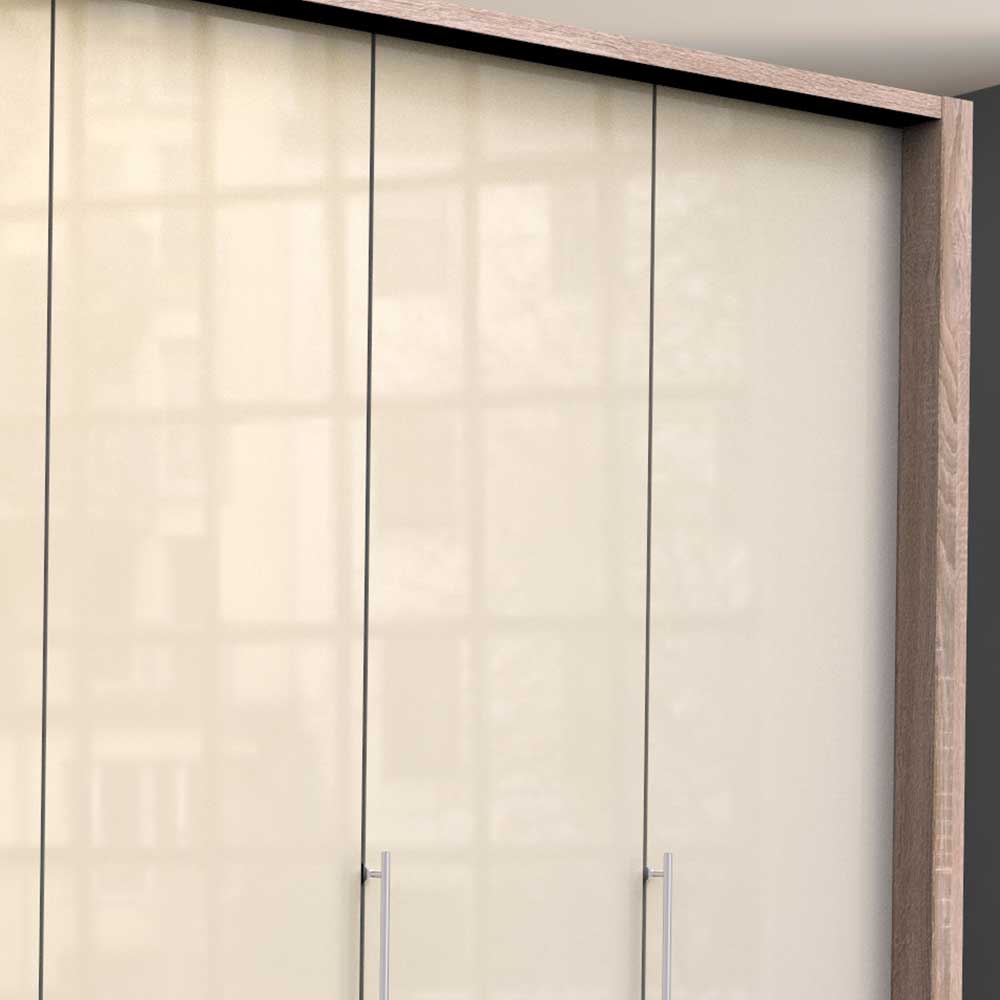 Obere Sektion des Schranks mit cremefarbenen Hochglanztüren und Holzoptik-Oberrahmen im Detail – Rativian