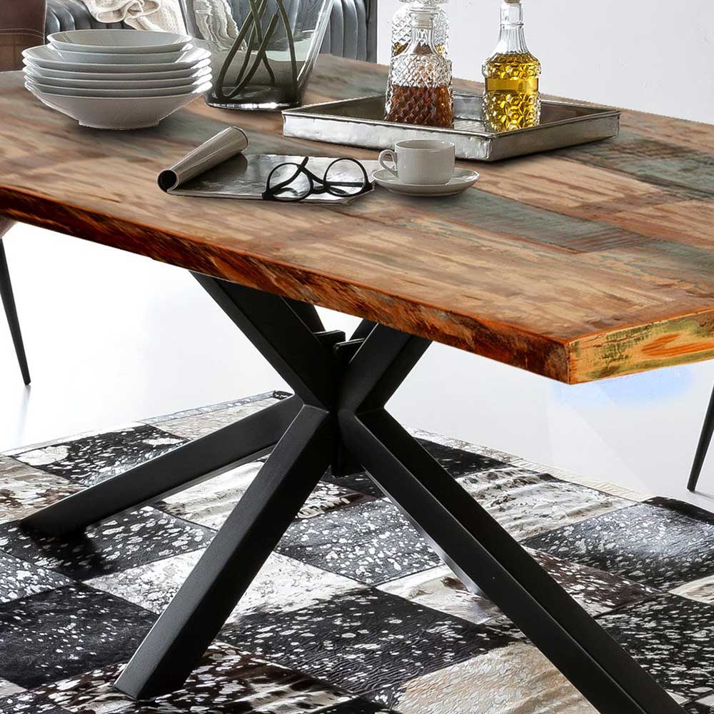 Massiver Holztisch mit lebendiger Baumkante und stabilem Spider-Metallgestell für den Essbereich – Leviza