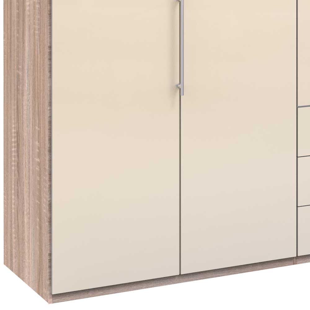 Kleiderschrank Detailansicht der Seitenwand in Holzoptik und cremefarbener Hochglanz-Tür – Rativian