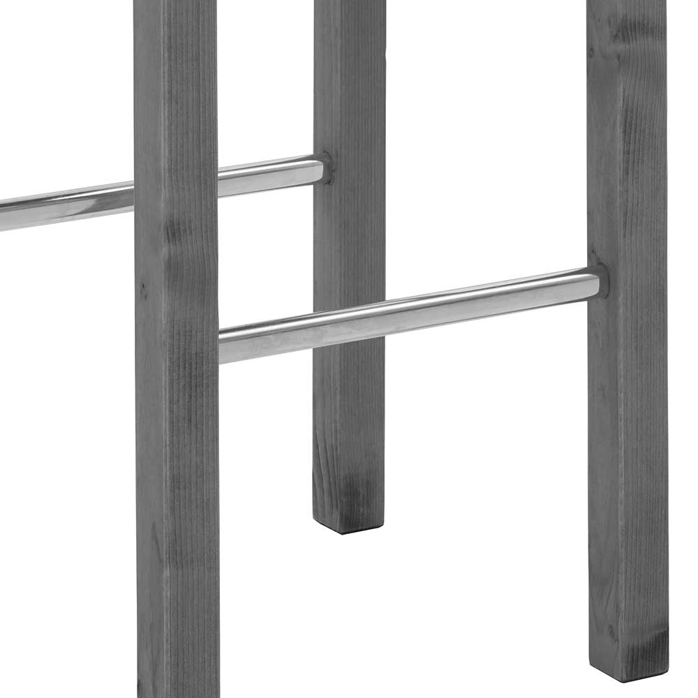 Fußstützen aus Metall am grauen Holzgestell des robusten Tresenhockers – Ziamora