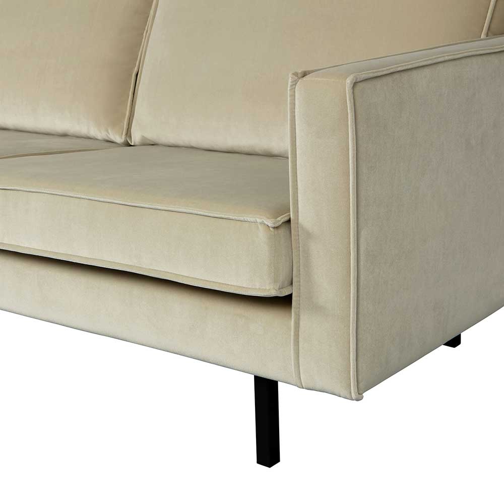 Seitenansicht der Couch mit schwarzem Metallfuß und graugrüner Samt-Armlehne – Vontada