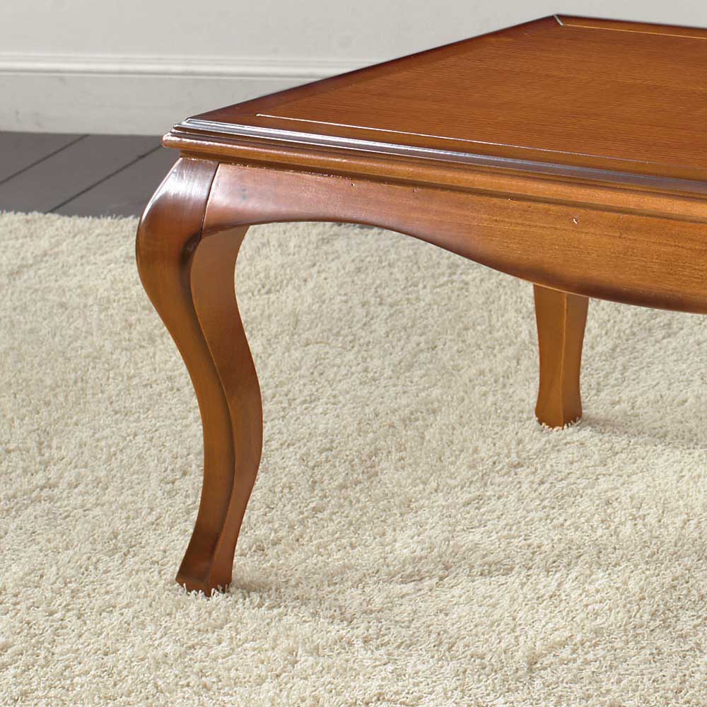 Couchtisch aus Massivholz mit elegant geschwungenem Tischbein in Holzoptik – Mugello