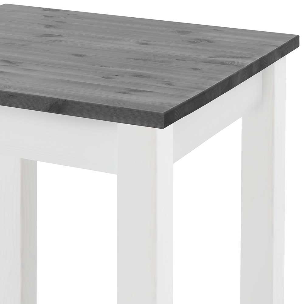 Graue Tischplatte mit sichtbarer Holzmaserung und weißem Rahmen des Bartisches – Mantryna