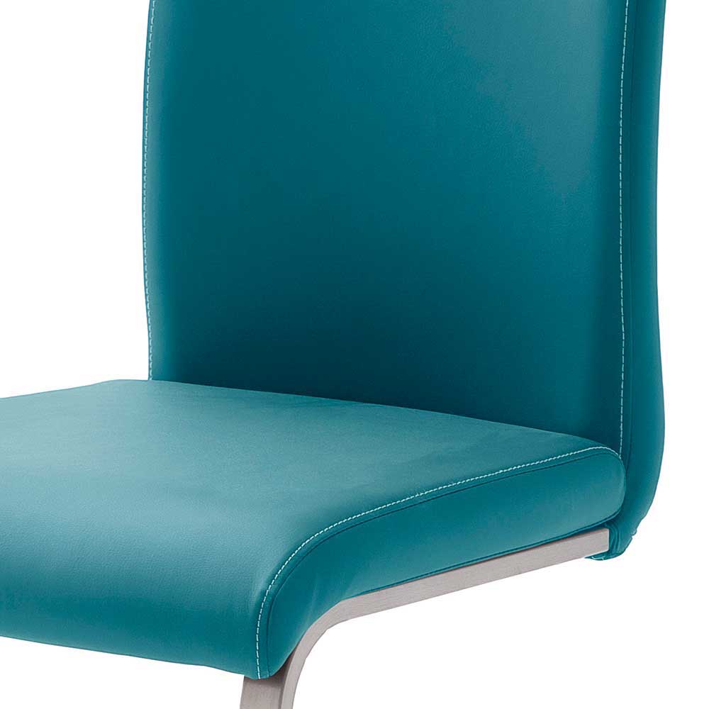 Freischwinger Stuhl Seitenansicht mit gepolsterter Sitzfläche und Rückenlehne in Petrol Blau – Laida