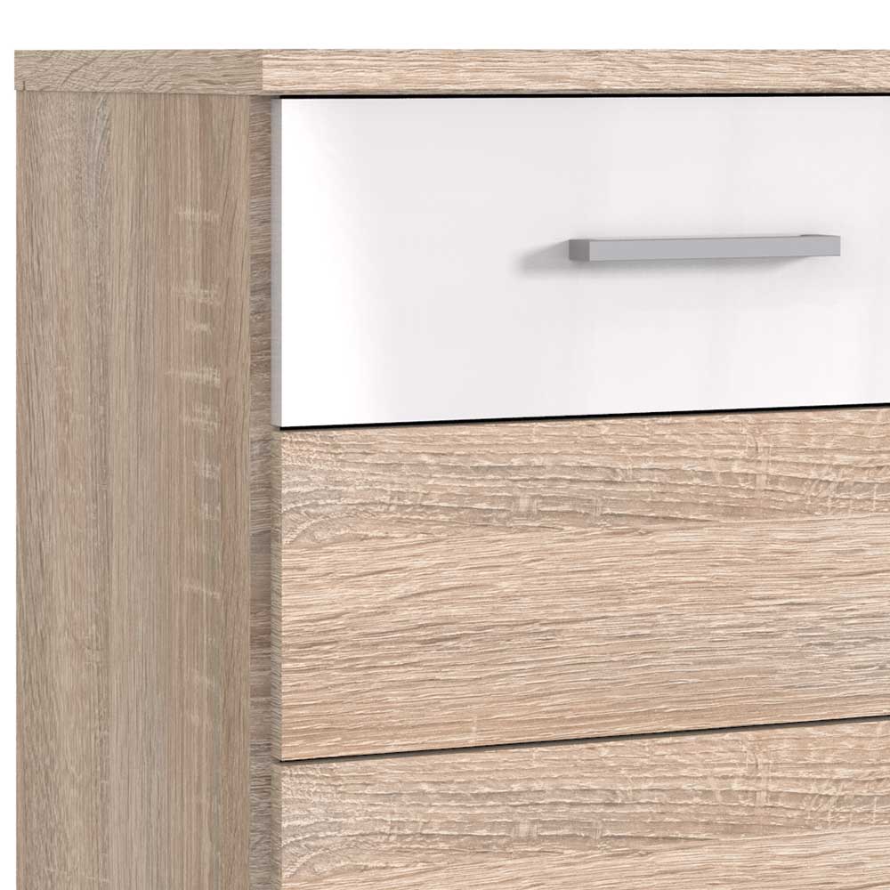 Kommode mit einer weißen Schublade und zwei holzfarbenen Schubladen im Detail – Fabricus