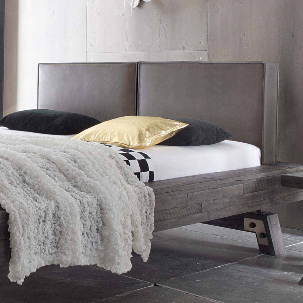 Graues Massivholzbett mit elegant gepolstertem Kopfteil und robustem Holzrahmen – Firendra