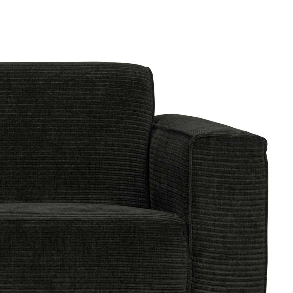 Armlehne und Rückenlehne des Federkern Sofas in dunkelgrauem Cordstoff – Rouge