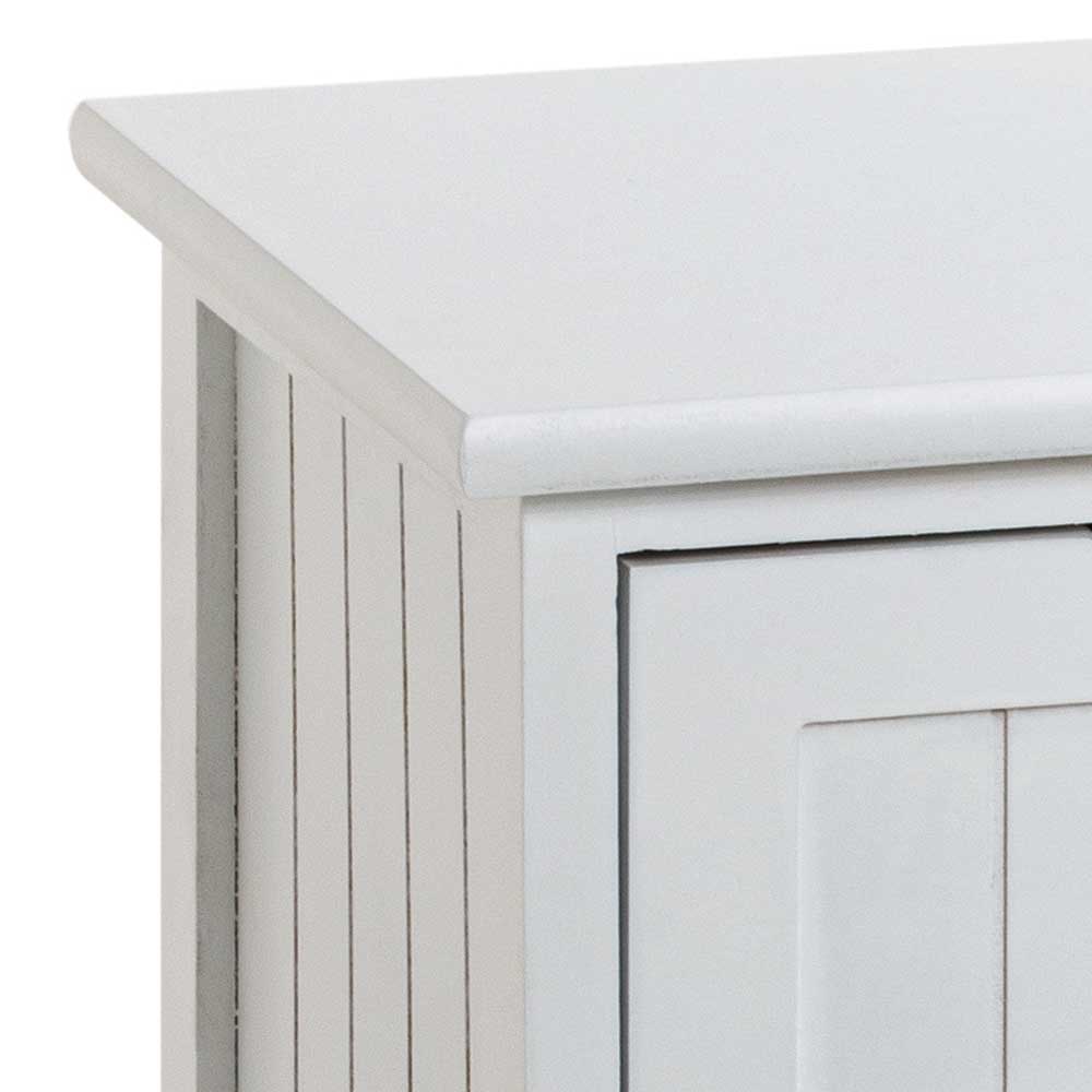 Detail der oberen Kante und der Seitenverkleidung der weißen Kommode – Sandi