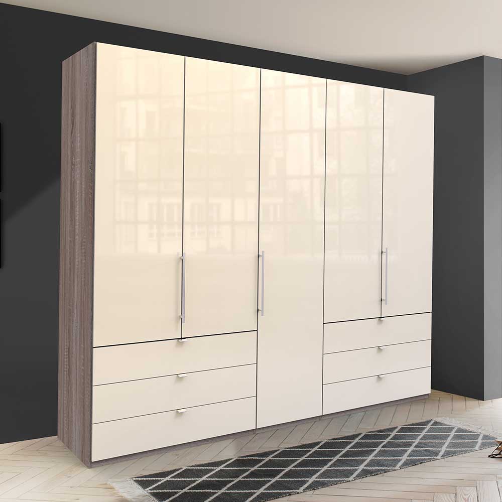 Großer Kleiderschrank creme Hochglanz mit Holzelementen und Schubladen im Schlafzimmer – Porecca