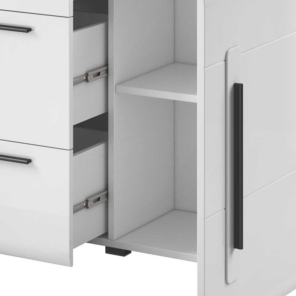 Weißes Sideboard mit offenem Regalfach und sichtbaren Schubladenschienen im Detail – Baranoma