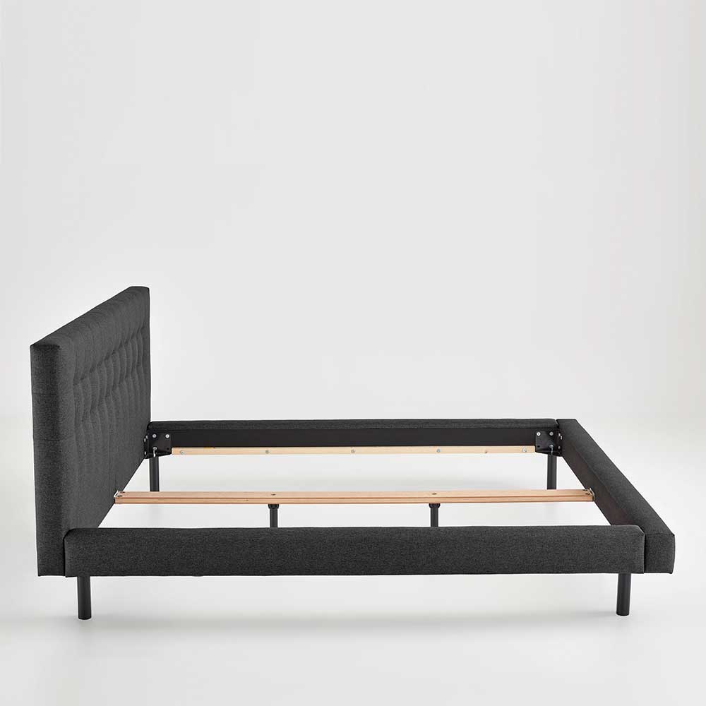 Modernes Doppelbett in Dunkelgrau mit Stoffbezug und schwarzem Bettrahmen – Onesty